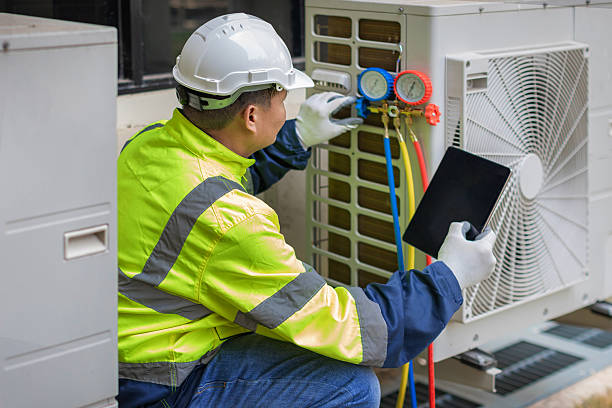Professional Air Duct Cleaning technician working in Dora, MO